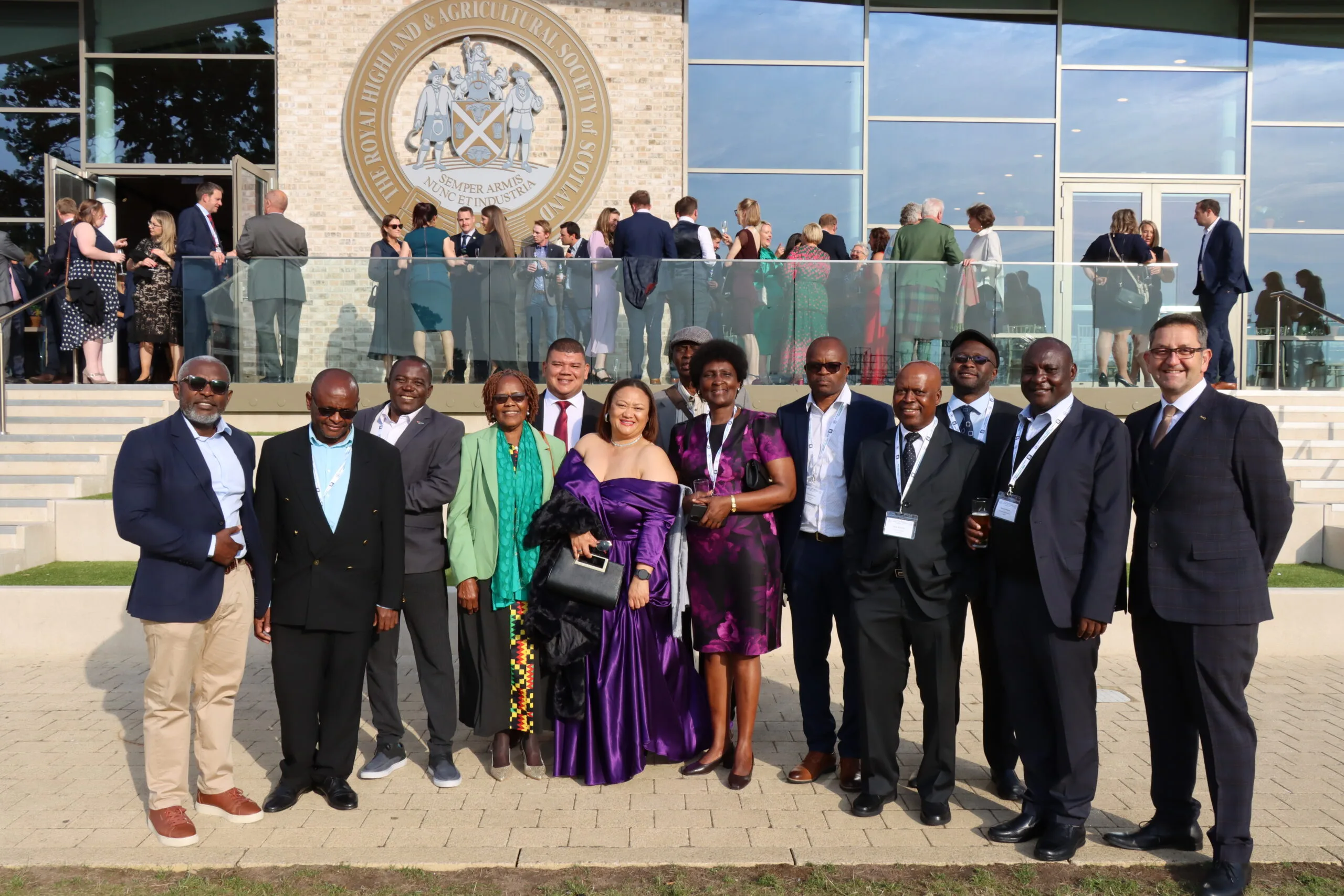 Photo of a group of people standing outside the conference